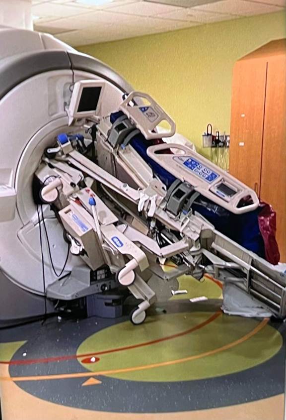 A medical equipment in a room

Description automatically generated
